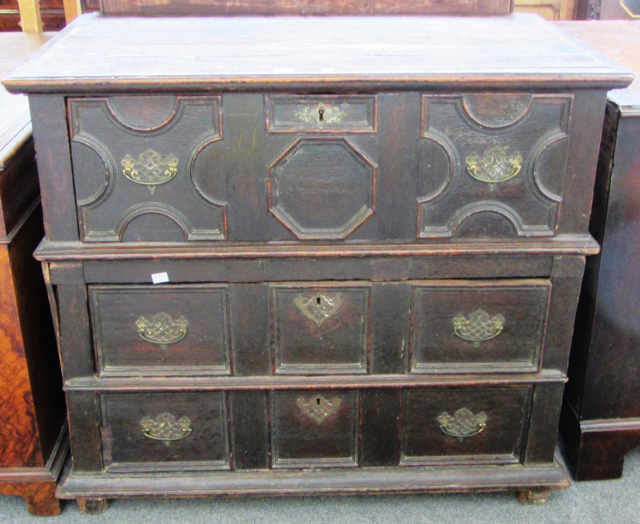 Appraisal: A late th century oak two section chest of three