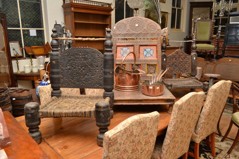 Appraisal: THREE CARVED AFGHAN PEDI CHAIRS THREE DECORATIVLY CARVED PAINTED AFGHAN