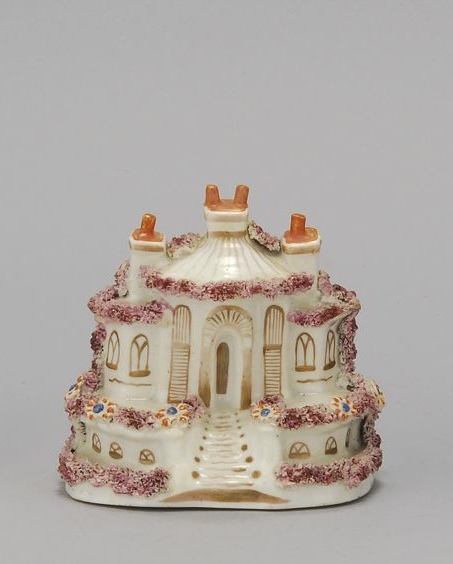 Appraisal: STAFFORDSHIRE PORCELAIN COTTAGE Mid- th CenturyWith lavendar and floral cole