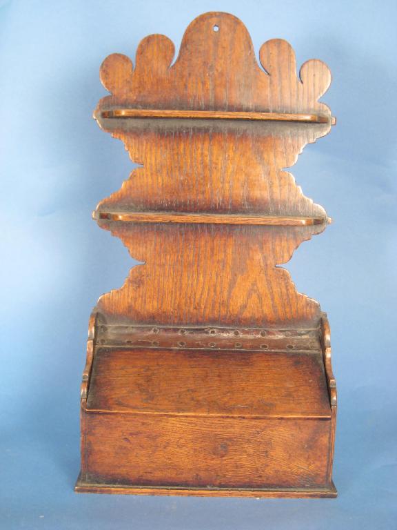 Appraisal: An antique Candle Box with carved shaped back the box