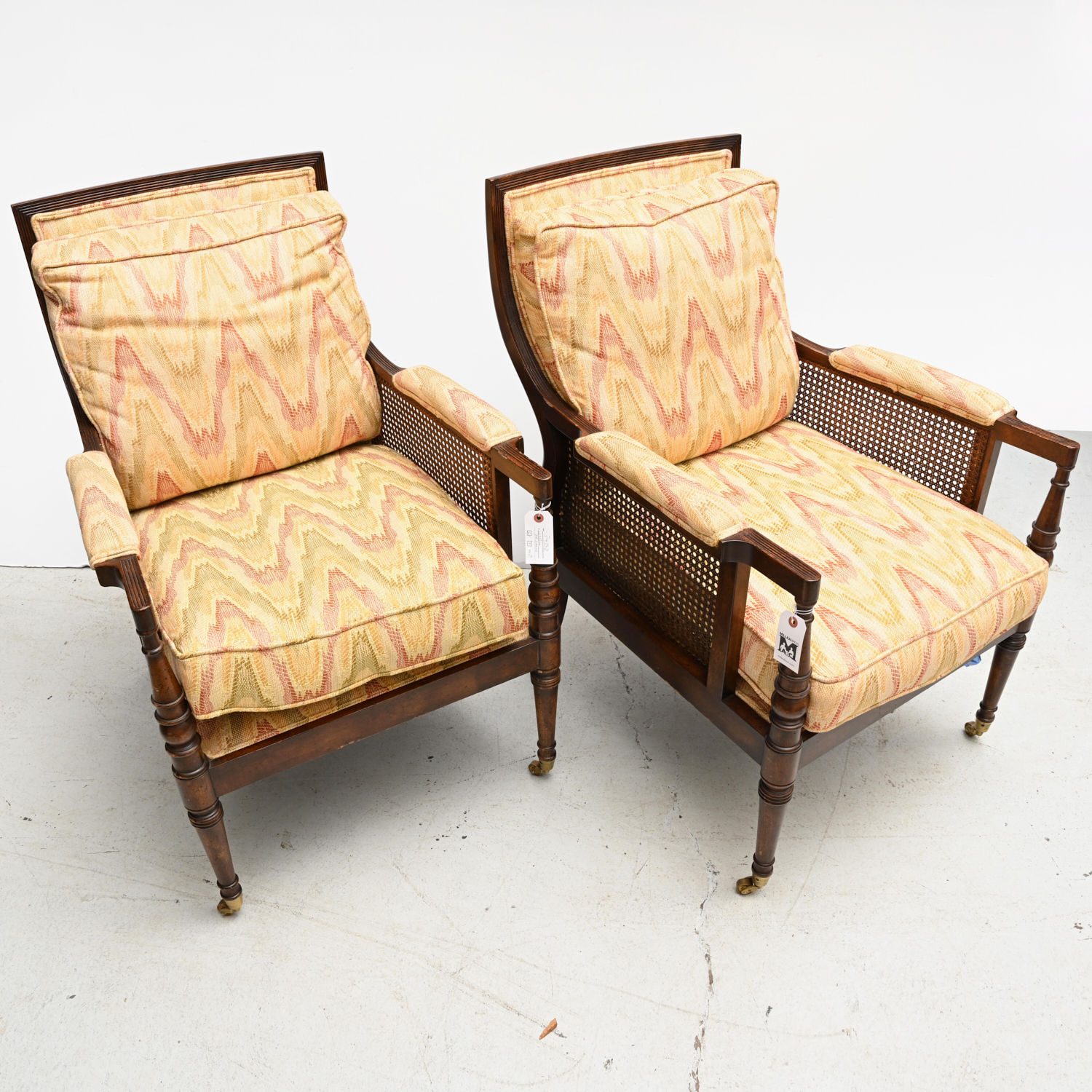 Appraisal: NICE PAIR REGENCY STYLE CANED BERGERES th c with upholstered