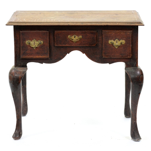 Appraisal: A George II oak lowboy with line inlaid top three