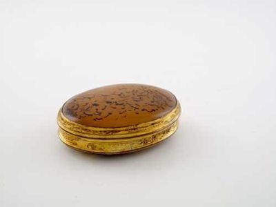 Appraisal: A George III gilt metal mounted oval snuff box with