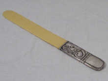 Appraisal: Russian Interest A silver and ivory page turner letter opener