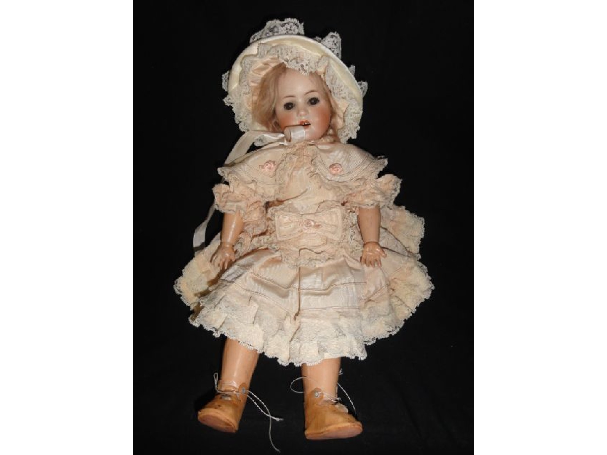 Appraisal: An antique German bisque headed doll by Max Handwerck marked