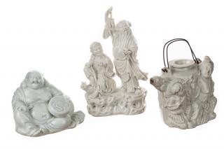 Appraisal: A GROUP OF THREE BLANC-DE-CHINE FIGURES including a group of