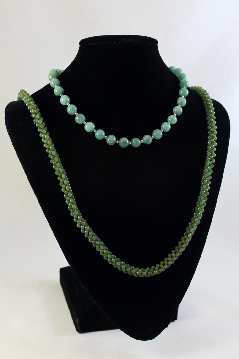 Appraisal: TWO GREEN HARDSTONE BEAD NECKLACES including a - necklace with