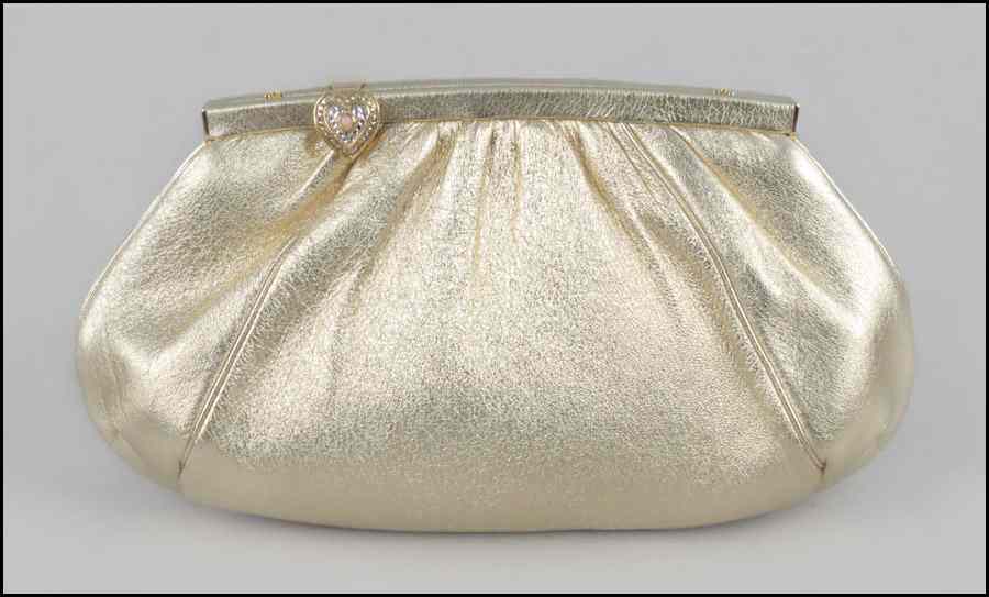 Appraisal: JUDITH LEIBER GOLD LEATHER CLUTCH HANDBAG With a heart closure