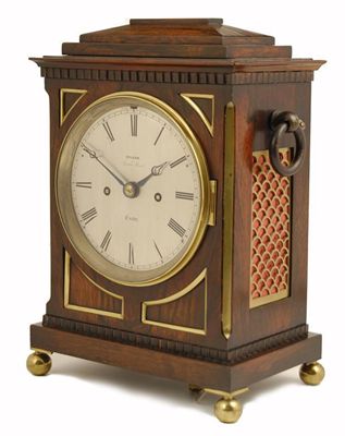 Appraisal: An th century rosewood and brass mounted repeating bracket clock