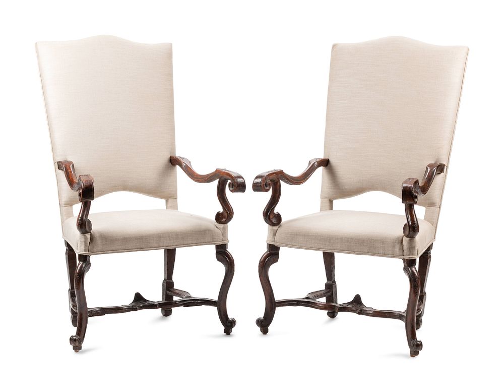 Appraisal: A Pair of Regence Carved Walnut Fauteuils A Pair of