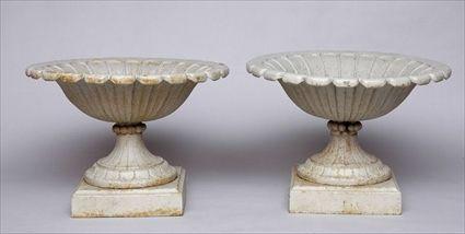 Appraisal: PAIR OF PAINTED CAST-IRON GARDEN URNS Each shallow fluted bowl