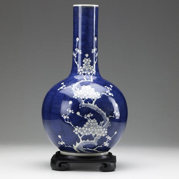 Appraisal: Chinese blue and white gourd-shaped vase on wood stand th