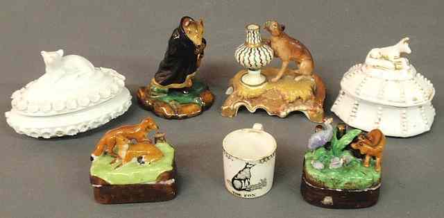 Appraisal: Four porcelain covered boxes with fox decorated lids English creamware