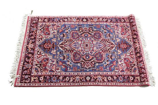 Appraisal: ORIENTAL RUG Second half th century Sino-Heriz pattern with blue