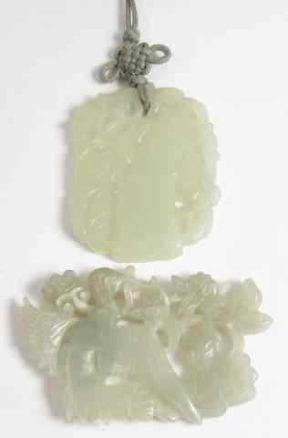 Appraisal: TWO CARVED LIGHT GREEN CHINESE PENDANTS together weighing grams One