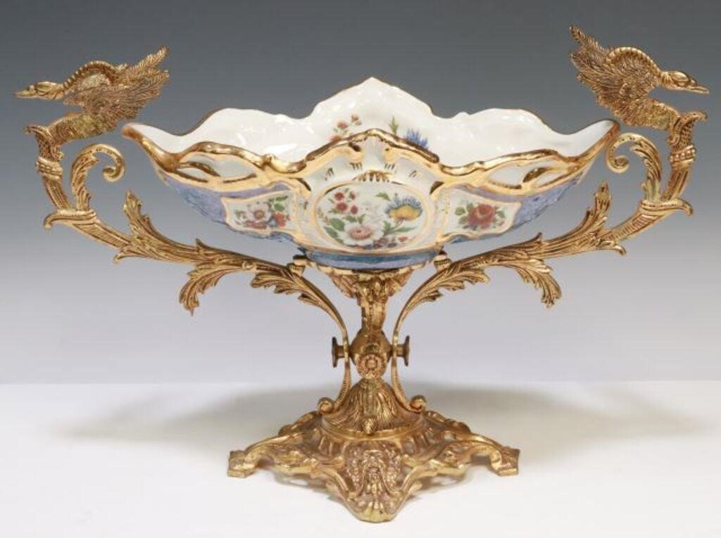 Appraisal: French porcelain centerpiece bowl with gilt metal mounts dual scrolled