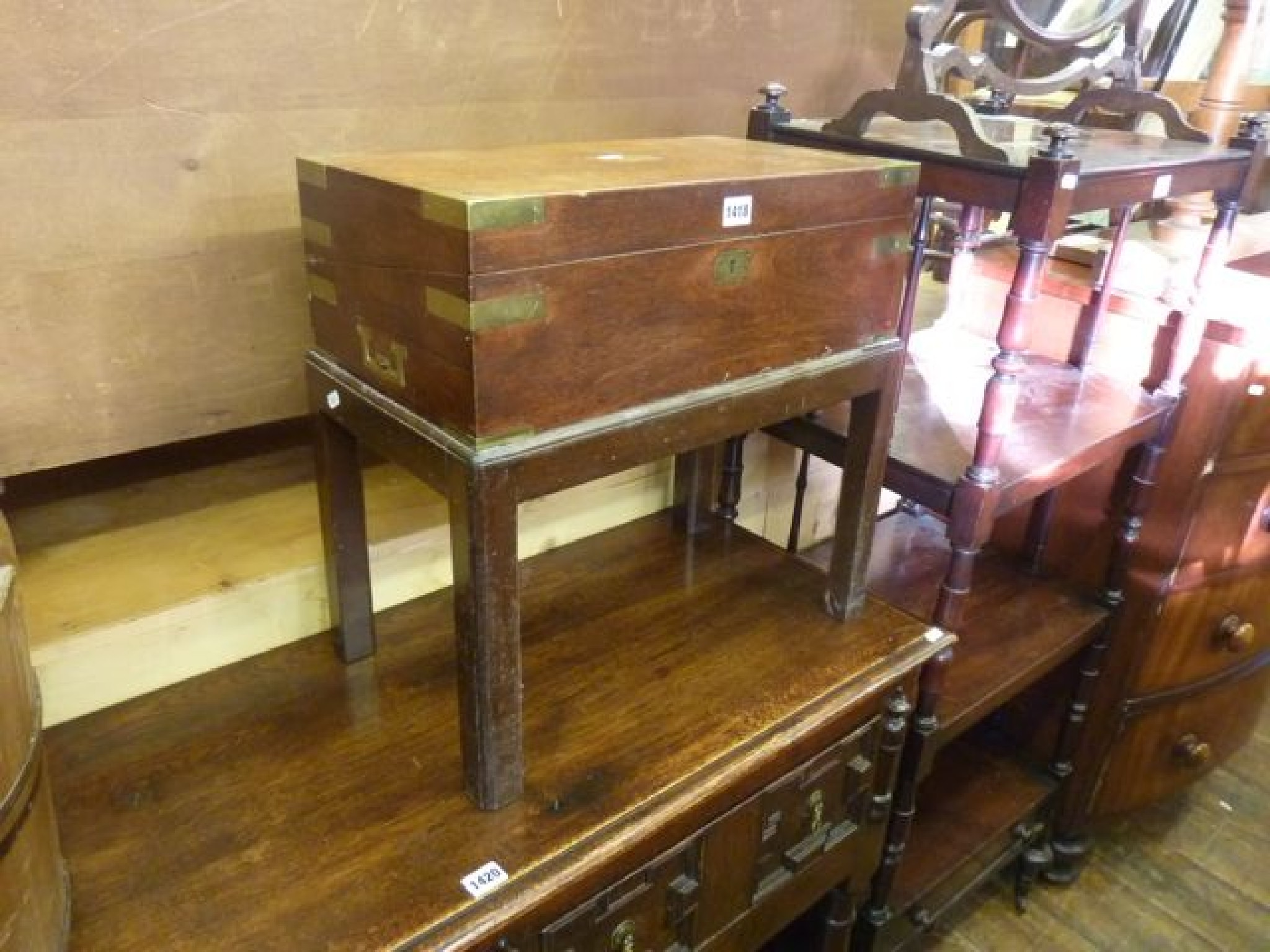 Appraisal: A mid th century mahogany writing box with brass banded