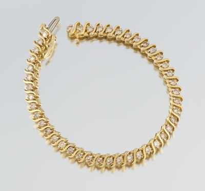 Appraisal: A Ladies' Diamond Tennis Bracelet k yellow gold bracelet set