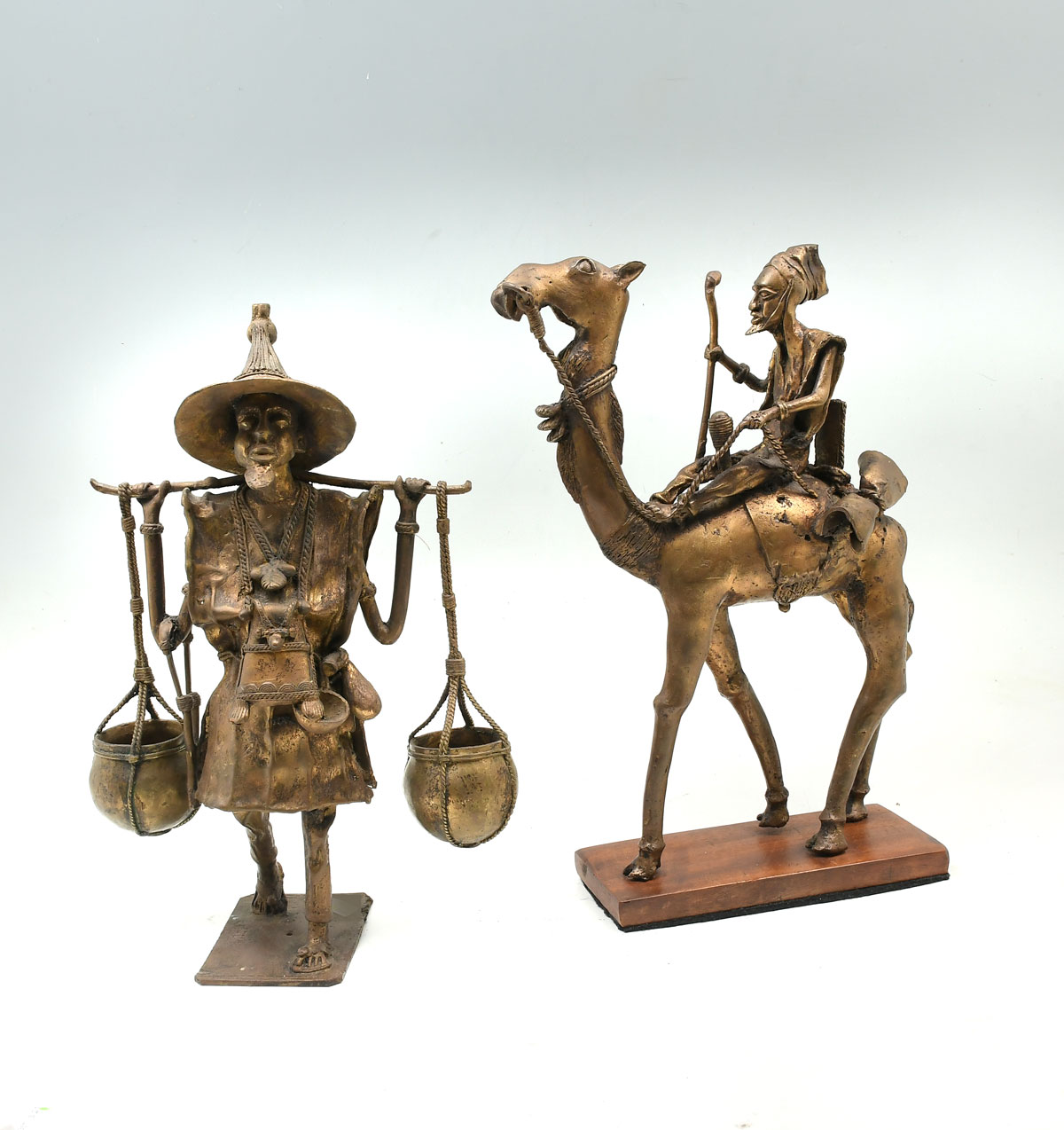 Appraisal: PC AFRICAN BRONZE - CAMEL AND WATER SELLER Bronze made