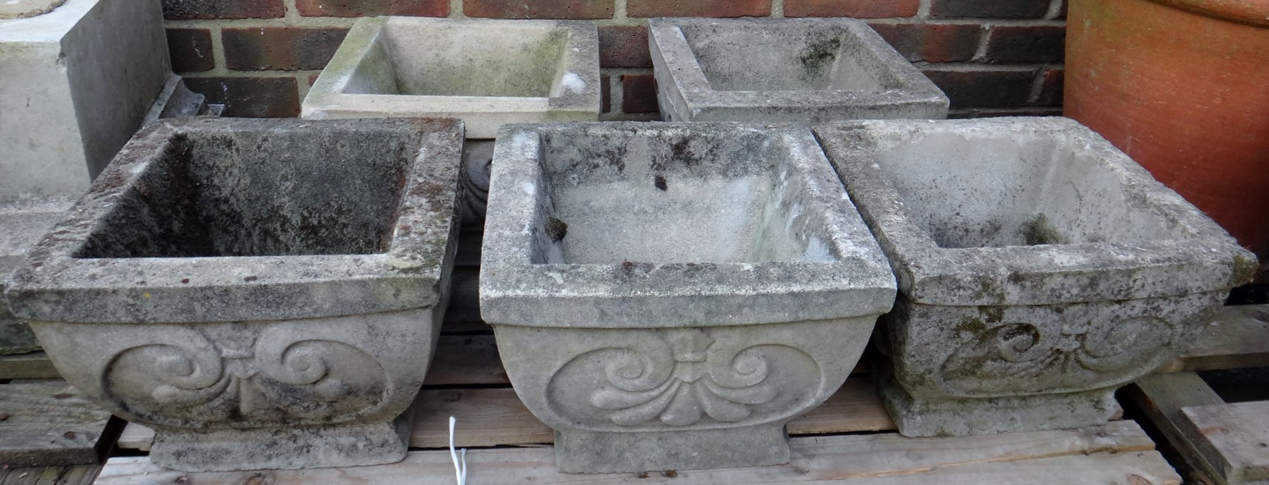 Appraisal: A set of five reconstituted stone square planters of tapering