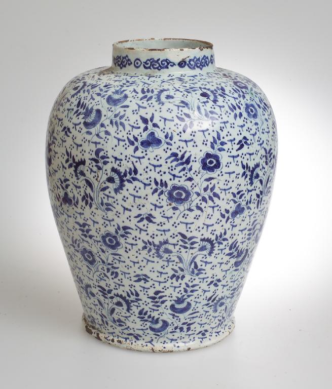 Appraisal: th CENTURY DELFT VASE of baluster form painted with leaves