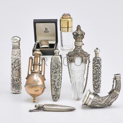 Appraisal: NINE SILVER SCENT FLASKS OR VINAIGRETTES Jeweled rococo chased silver-mounted