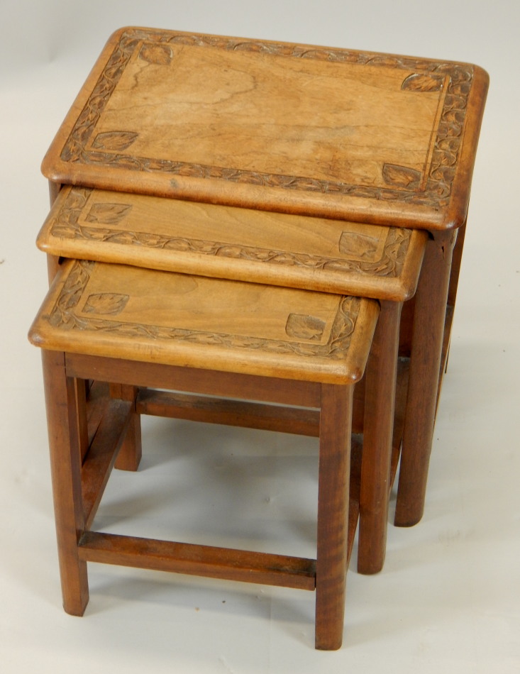 Appraisal: A nest of three Eastern hardwood tables each with a