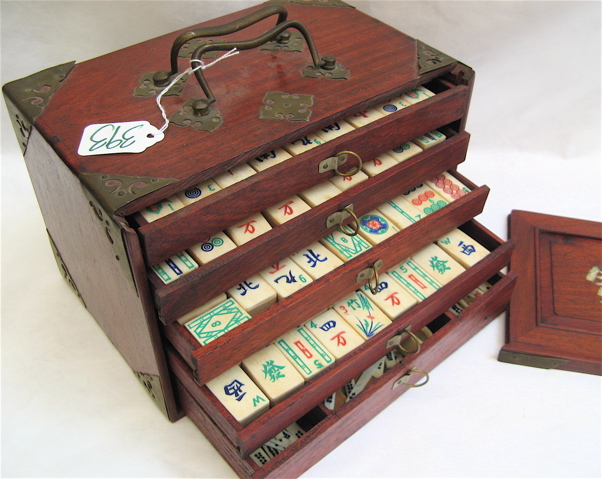 Appraisal: CHINESE MAHJONG SET wooden box with brass handles and fittings