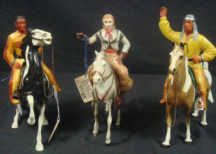 Appraisal: Plastic Cowboy cowgirl and Indian figures approx inches tall and