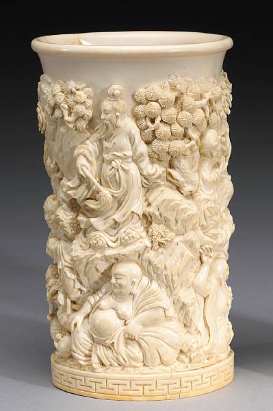 Appraisal: Ivory Carvings Carved in high relief with a complex scene