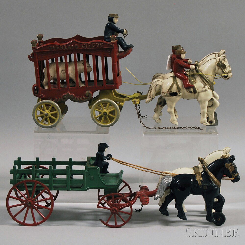 Appraisal: Two Cast Iron Horse-drawn Vehicles a Kenton Overland Circus wagon