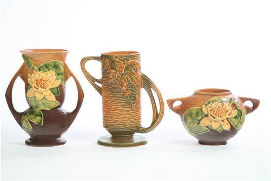 Appraisal: THREE PIECES OF ROSEVILLE A double handled vase in Bushberry