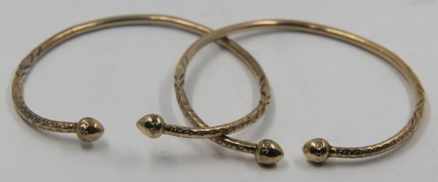 Appraisal: JEWELRY Pair of kt Gold Bangle Bracelets Total approx weight