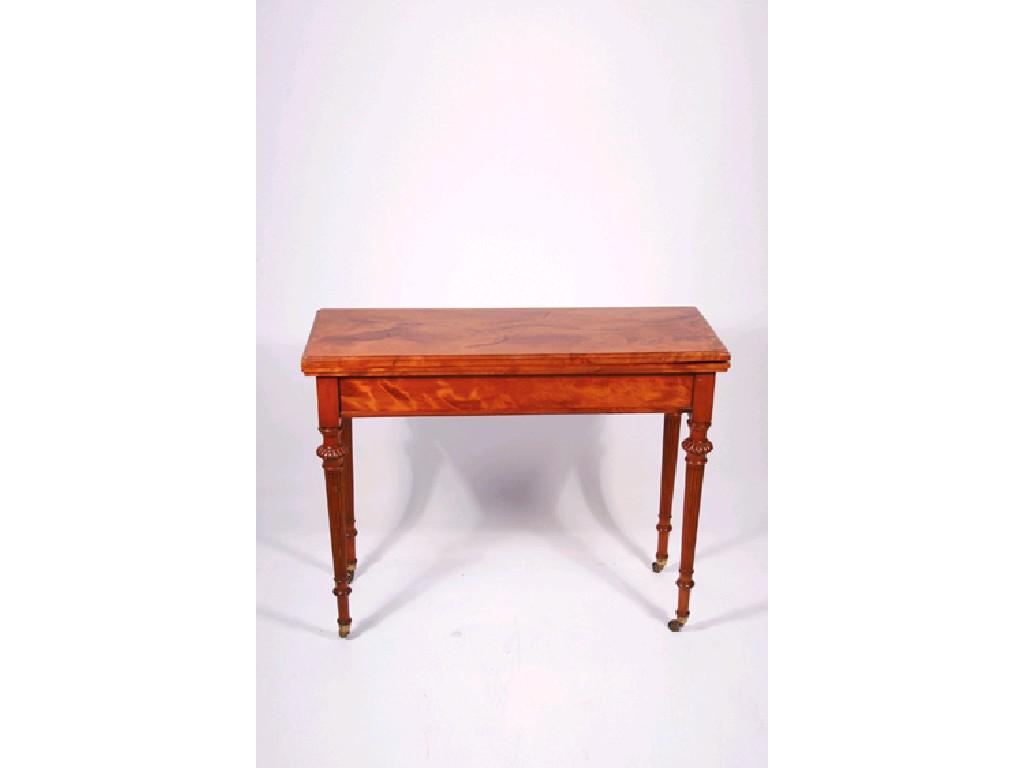 Appraisal: AN EDWARDIAN FOLD TOP TEA TABLE the rectangular top with