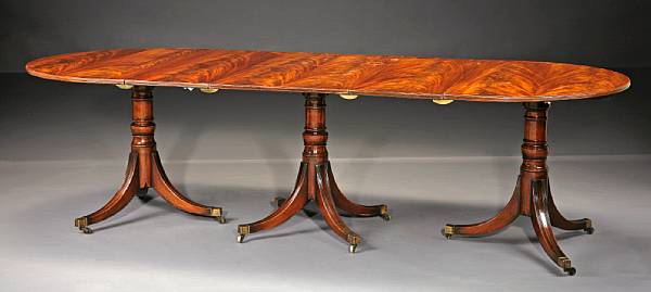 Appraisal: A Regency style mahogany triple pedestal dining table early th