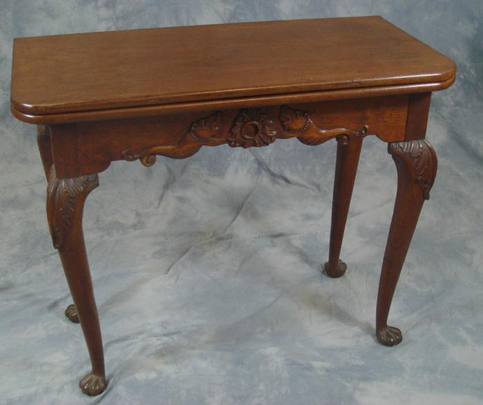 Appraisal: Carved oak Georgian style card table with rear swing leg