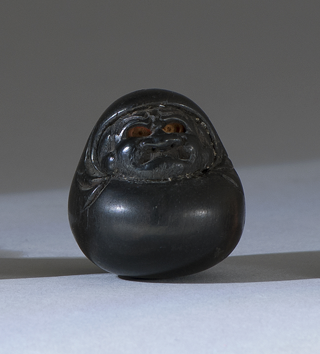 Appraisal: WOOD NETSUKE Meiji PeriodBy Masayuki Depicting Daruma enveloped in his