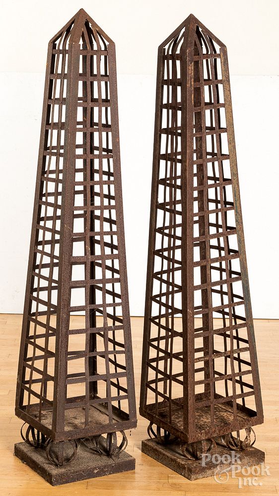 Appraisal: Pair of iron garden obelisks Pair of iron garden obelisks