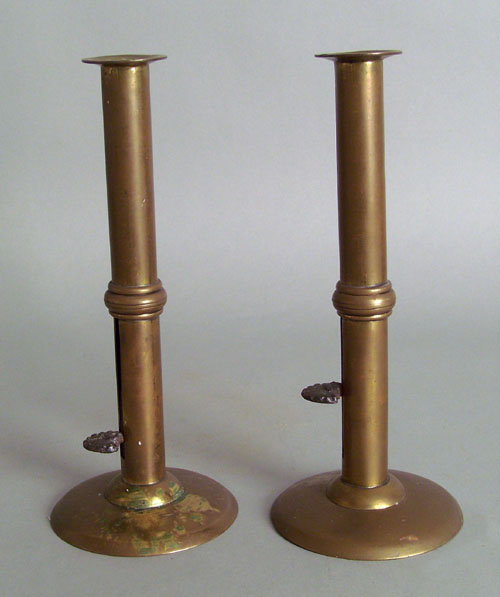 Appraisal: Pair of brass hogscraper candlesticks with wedding bands th c