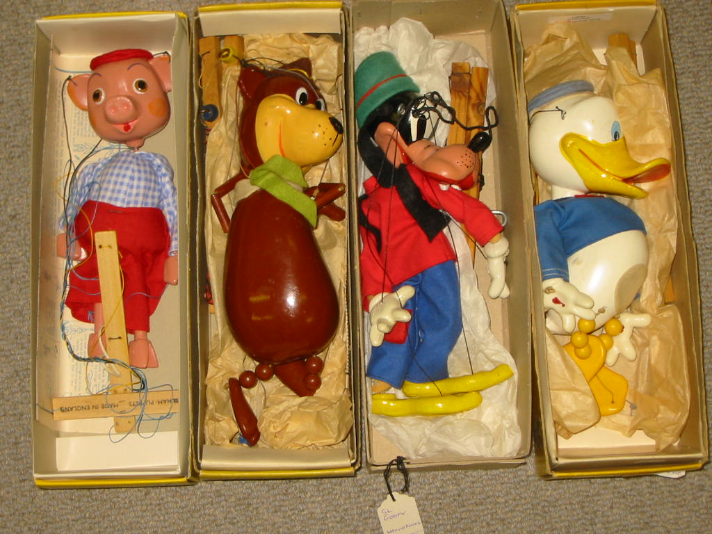 Appraisal: Four Pelham puppets comprising Donald Duck c Yogi Bear SS