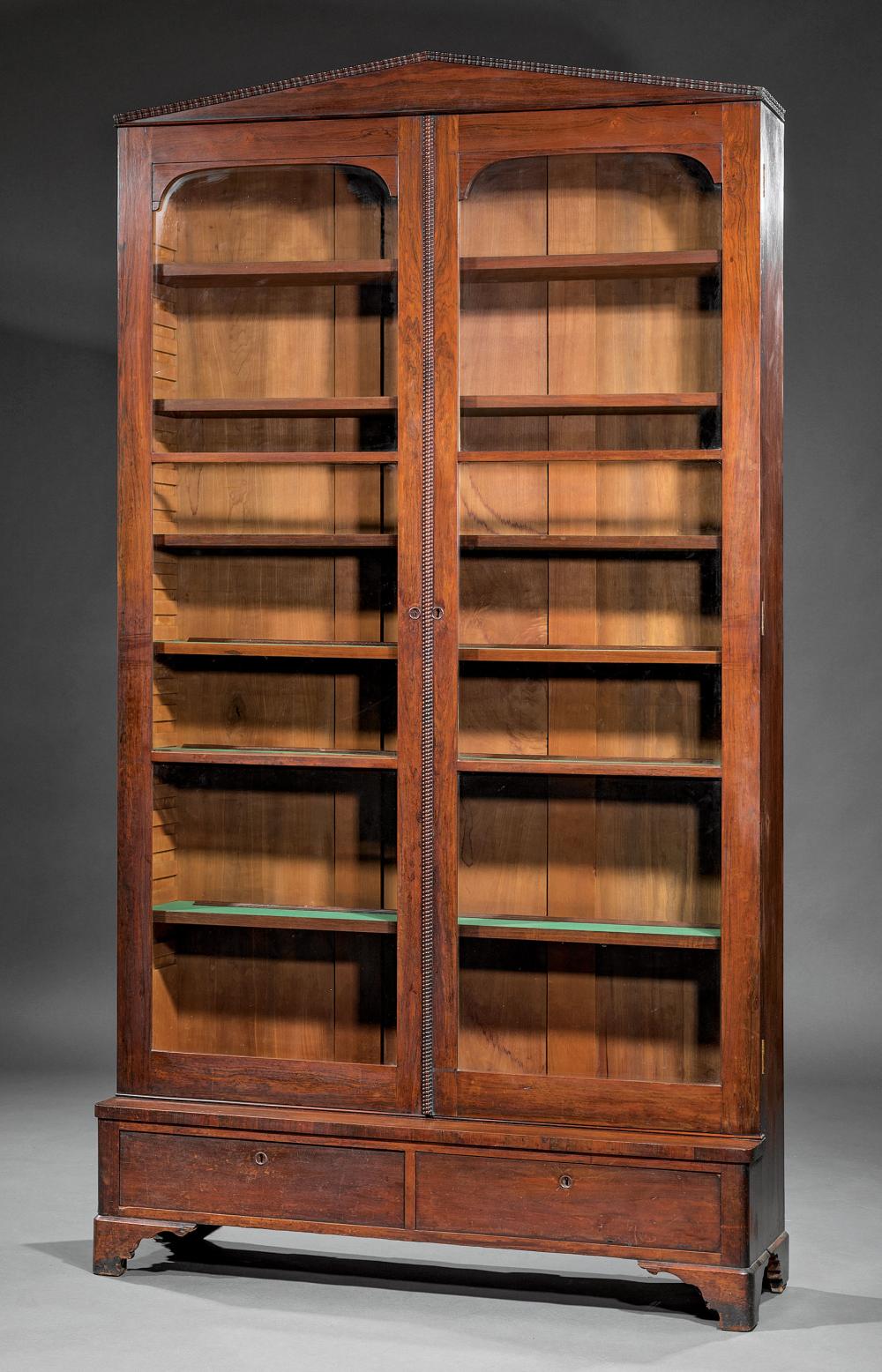 Appraisal: American Late Classical Rosewood Bookcase c ripple molded pediment glazed