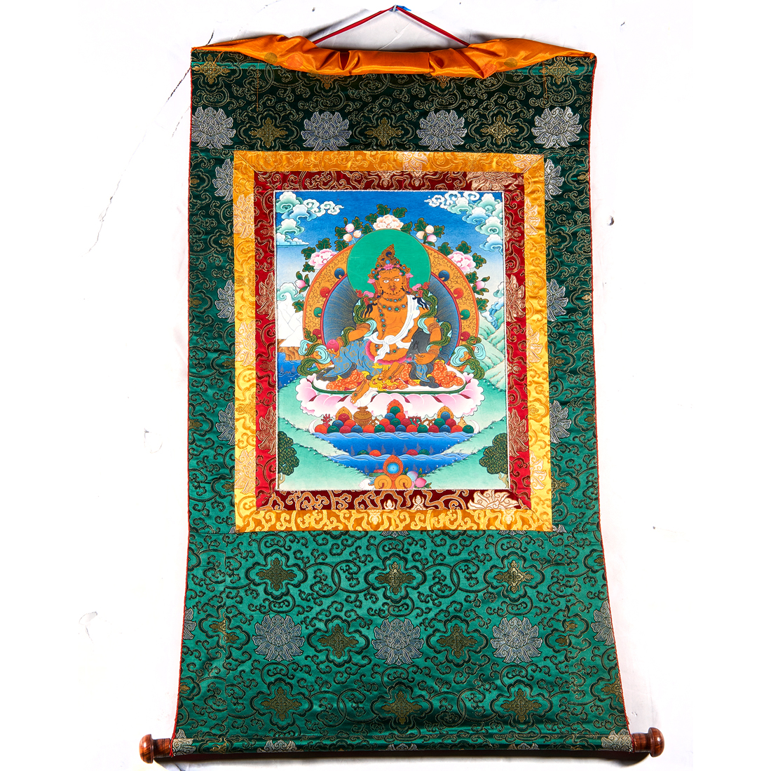 Appraisal: TIBETAN THANGKA Tibetan thangka depciting Jambhala with distemper on cloth