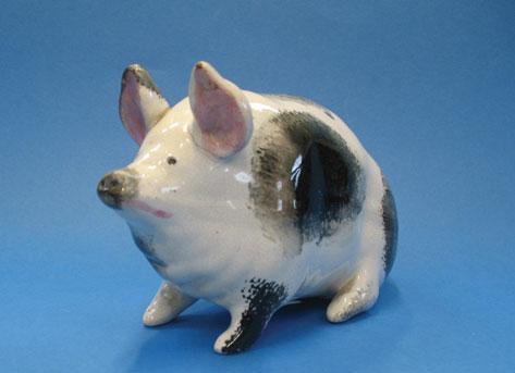 Appraisal: A WEMYSS PIG with black sponged body and pink painted