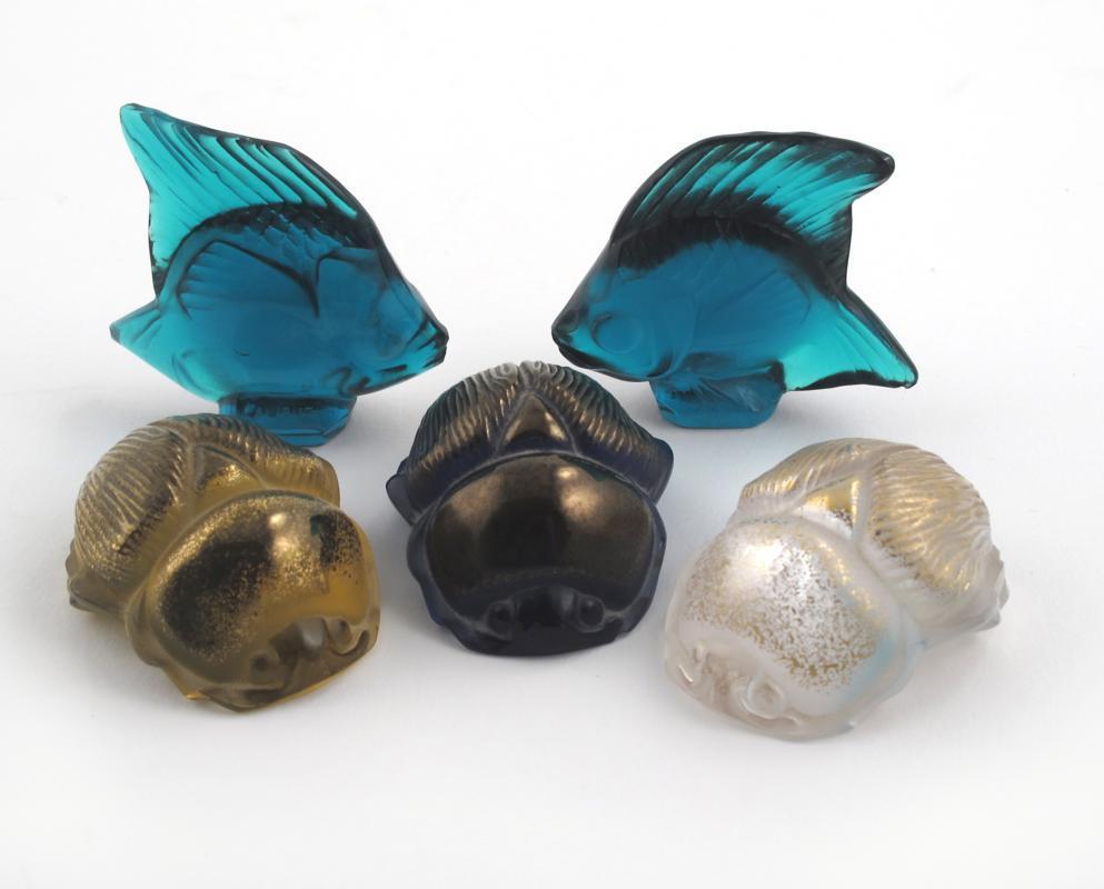 Appraisal: Two modern Lalique bottle green fish and three Lalique Scarabs