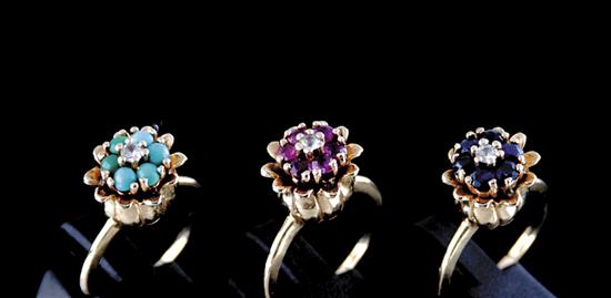 Appraisal: Three gemstone and gold rings circa one with center round-cut