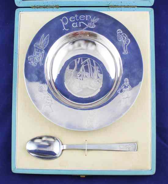 Appraisal: A cased 's engraved silver Peter Pan christening bowl and