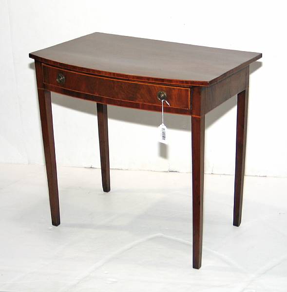 Appraisal: A George III mahogany bow front writing table last quarter