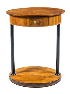 Appraisal: A Biedermeier Parcel Ebonized Birch Side Table Height x width