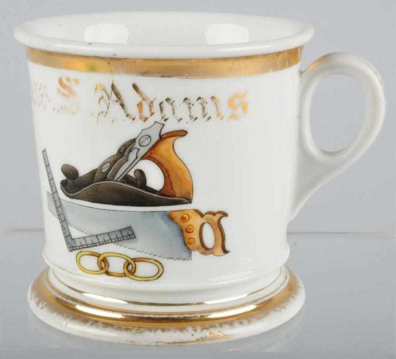 Appraisal: Carpenter Shaving Mug Description Marked Chas S Adams across top