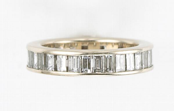 Appraisal: A baguette-cut diamond and k white gold eternity band estimated